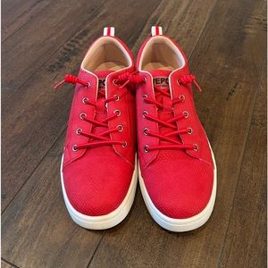 Red slip on sneakers
